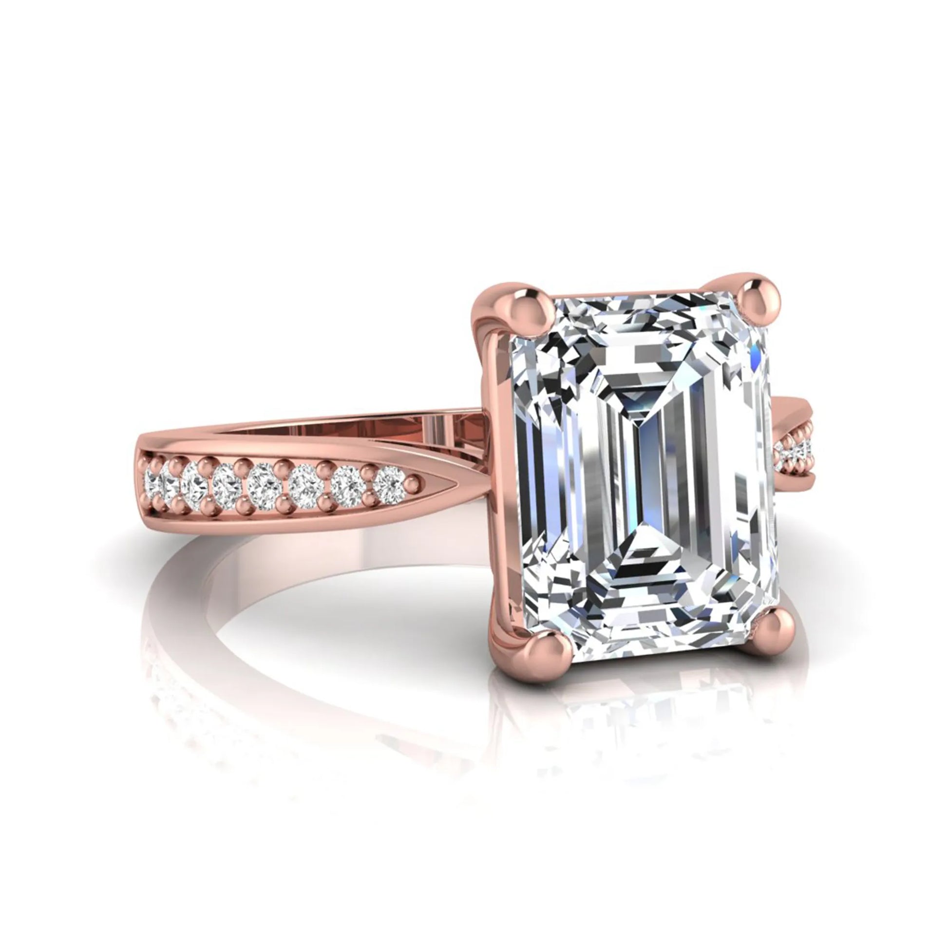 Emerald cut lab grown diamond engagement ring featuring a four-prong setting with round diamond accent band in a rose gold style design.