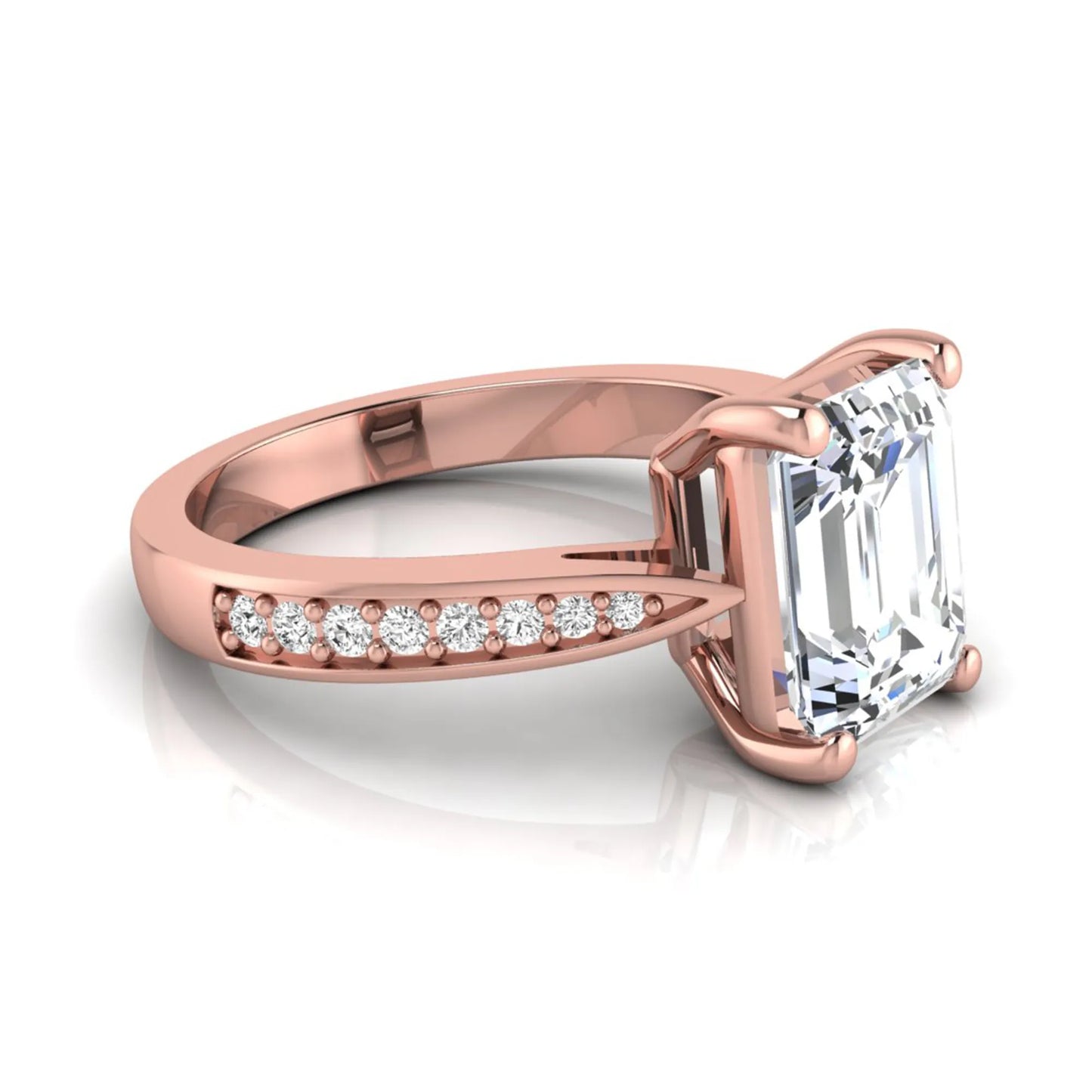 Emerald cut lab grown diamond engagement ring featuring a four-prong setting with round diamond accent band in a rose gold style design.