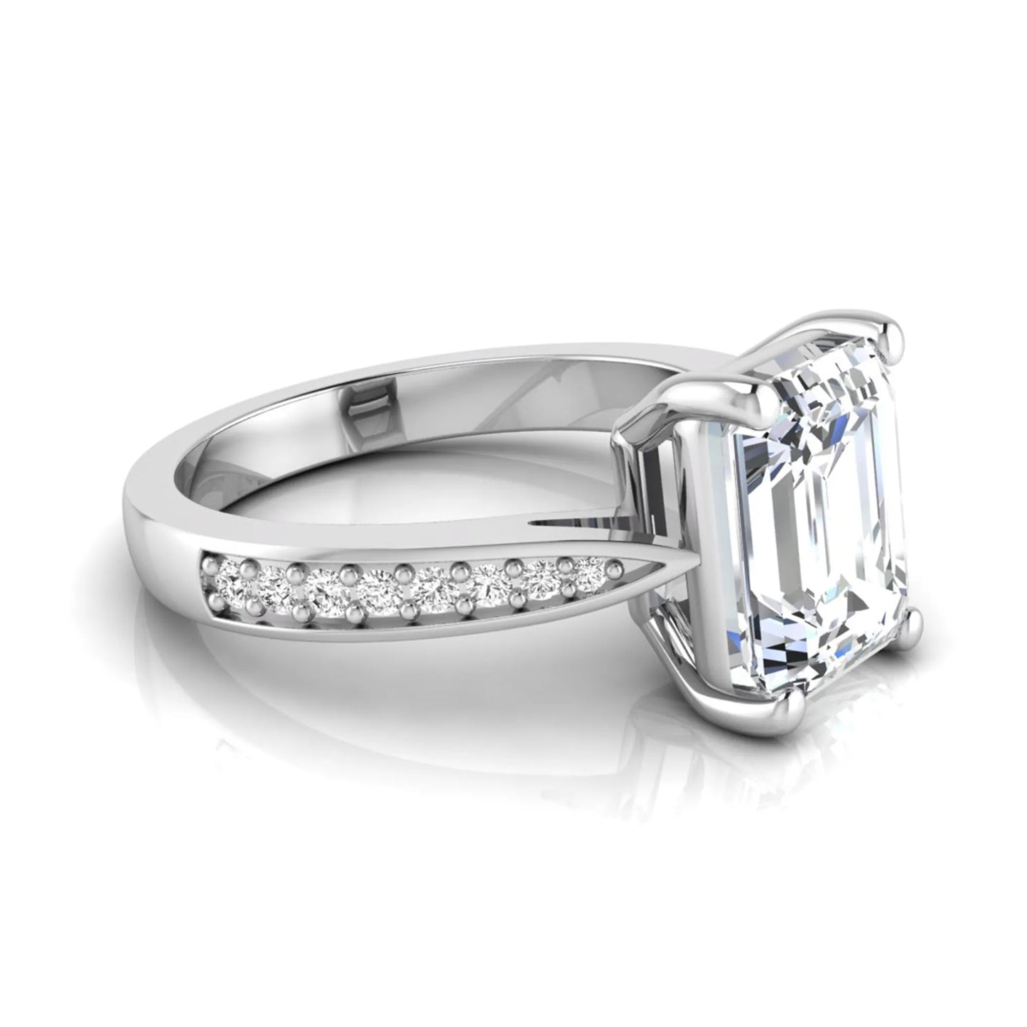Emerald cut lab grown diamond engagement ring featuring a four-prong setting with round diamond accent band in a white gold style design.