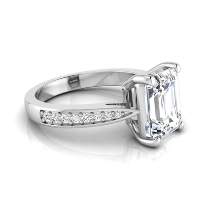Emerald cut lab grown diamond engagement ring featuring a four-prong setting with round diamond accent band in a white gold style design.