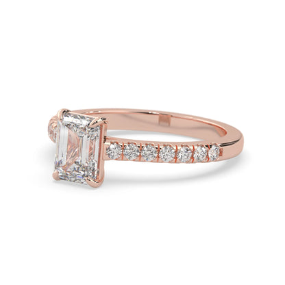 emerald cut lab grown diamond prong set engagement ring with pavé band and rose gold  metal tone design
