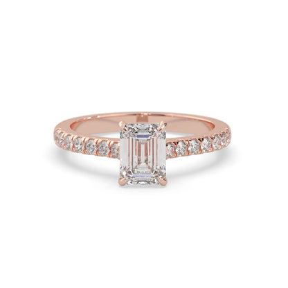 emerald cut lab grown diamond prong set engagement ring with pavé band and rose gold  metal tone design