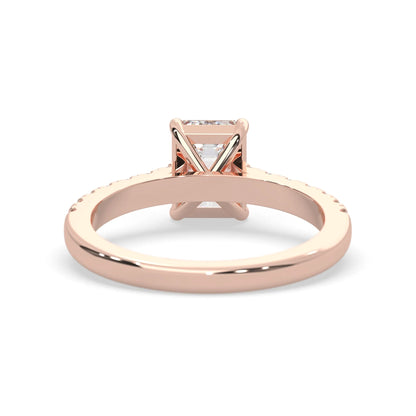 emerald cut lab grown diamond prong set engagement ring with pavé band and rose gold  metal tone design