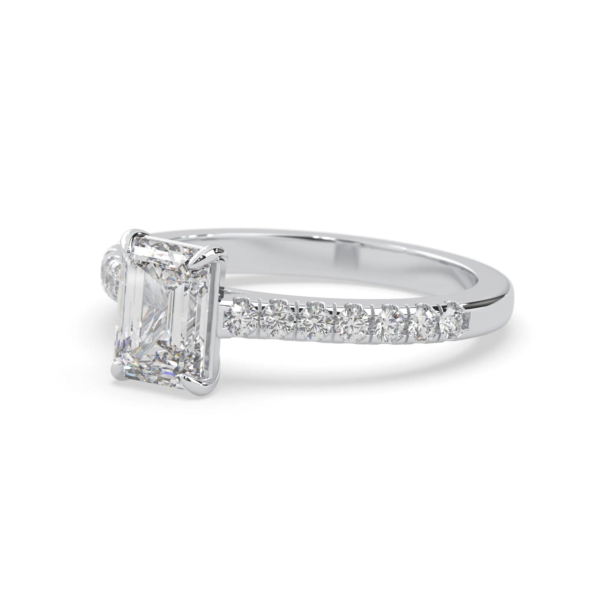 emerald cut lab grown diamond prong set engagement ring with pavé band and white gold  metal tone design
