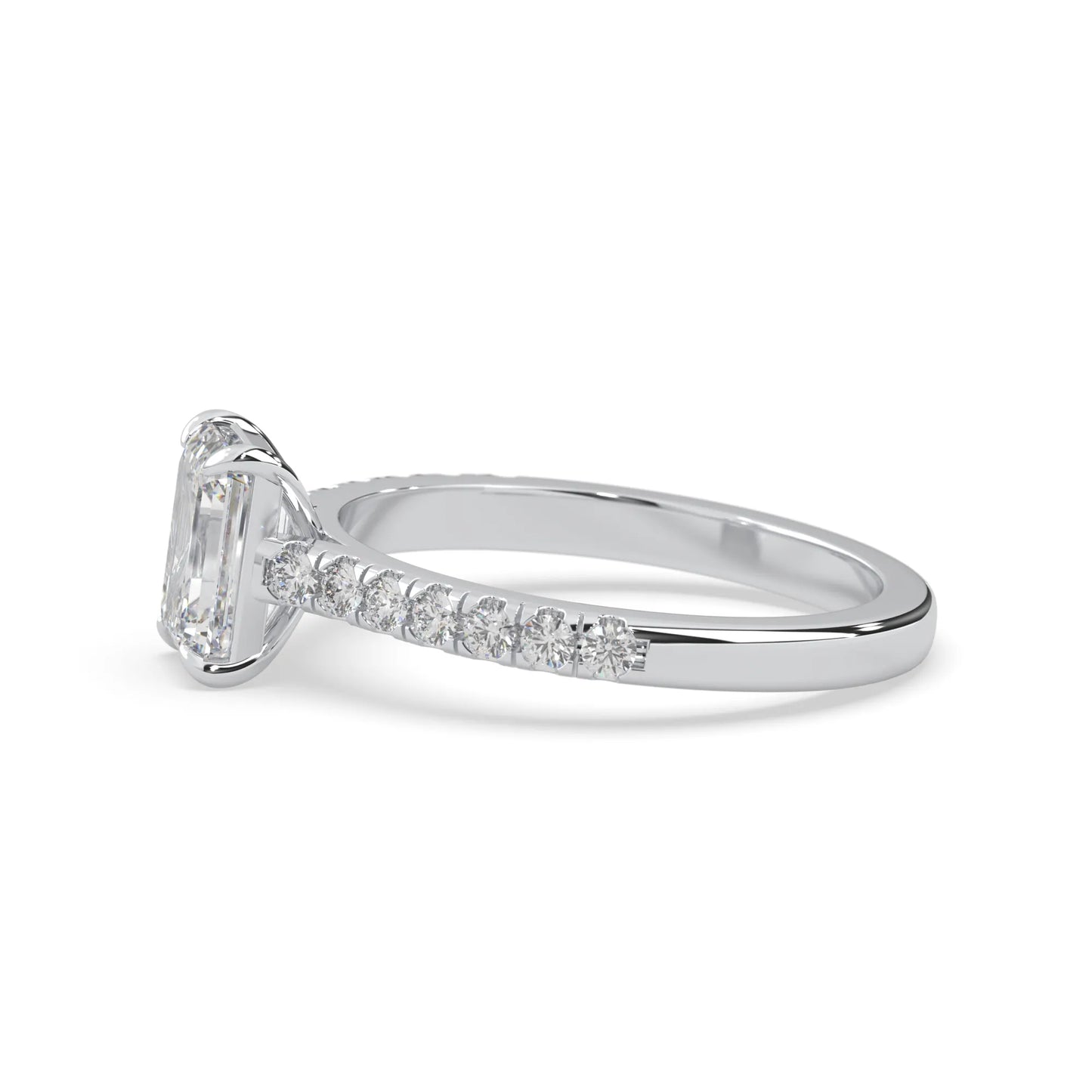 emerald cut lab grown diamond prong set engagement ring with pavé band and white gold  metal tone design