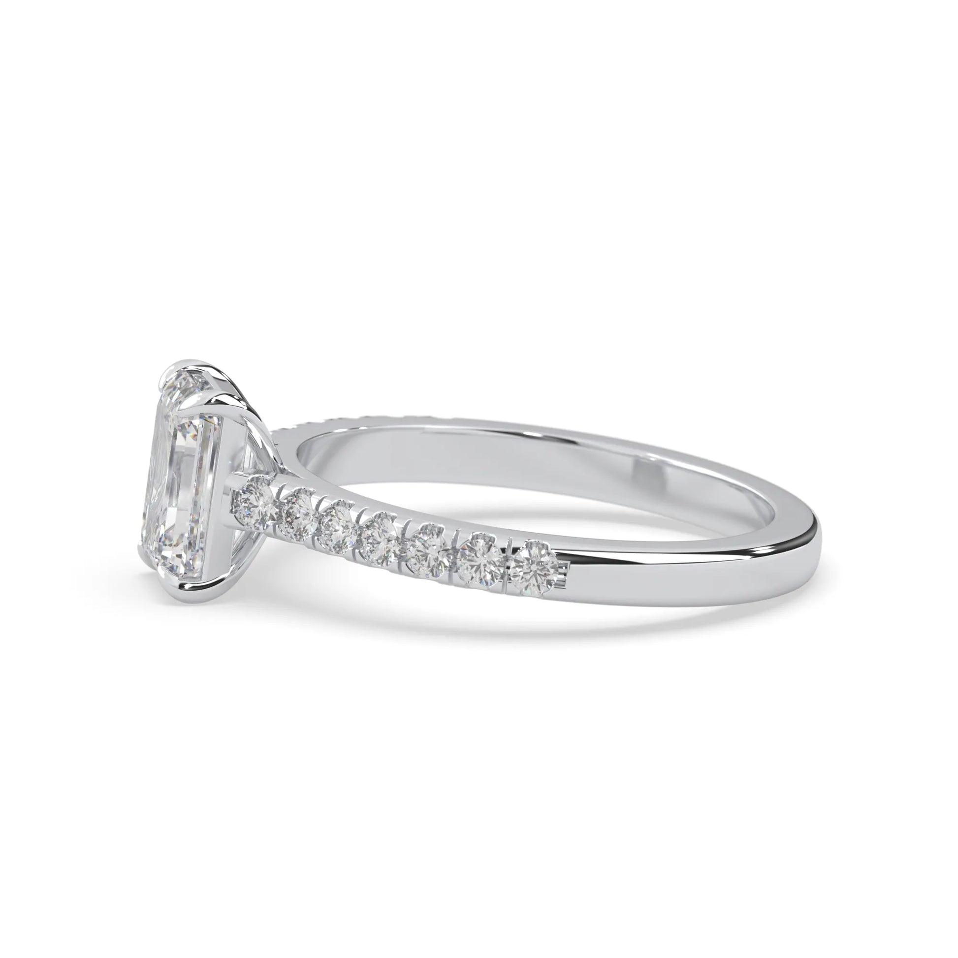 emerald cut lab grown diamond prong set engagement ring with pavé band and white gold  metal tone design
