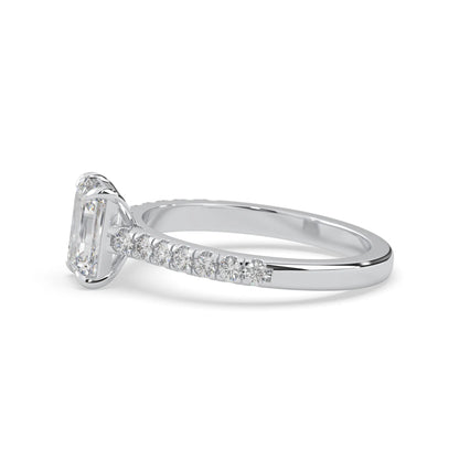 emerald cut lab grown diamond prong set engagement ring with pavé band and white gold  metal tone design