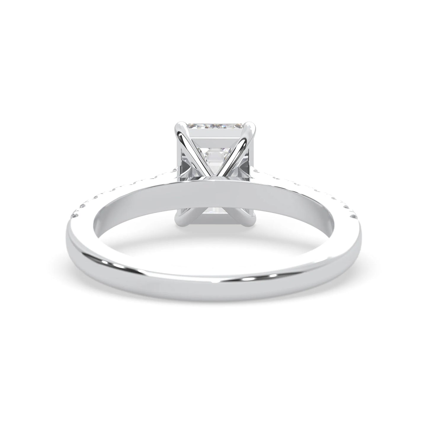 emerald cut lab grown diamond prong set engagement ring with pavé band and white gold  metal tone design