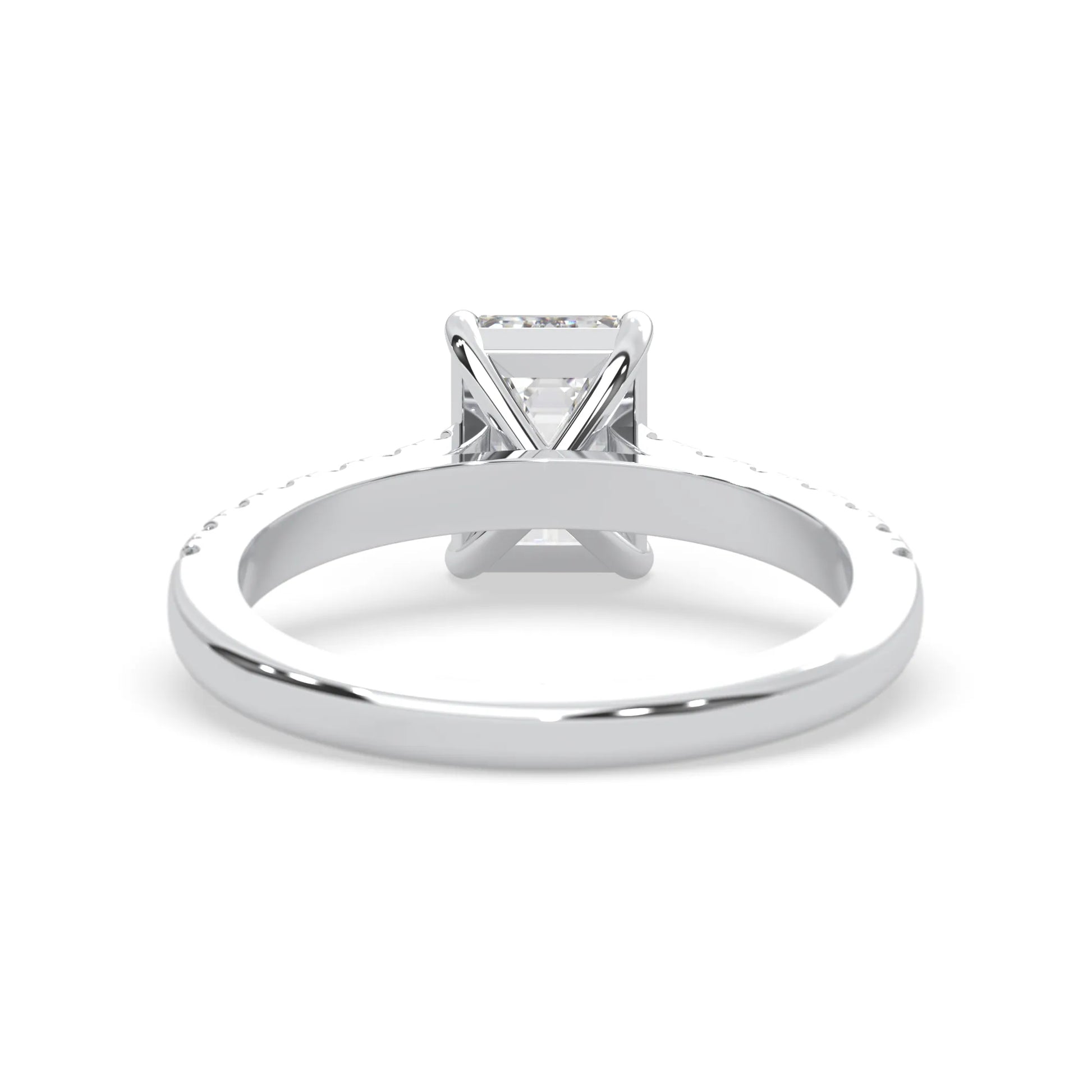 emerald cut lab grown diamond prong set engagement ring with pavé band and white gold  metal tone design