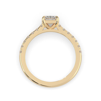 emerald cut lab grown diamond prong set engagement ring with pavé band and yellow gold  metal tone design