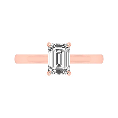 Emerald cut lab grown diamond solitaire engagement ring featuring a 1.06 carat emerald diamond in a classic four-prong setting in rose gold
