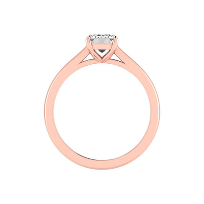 Emerald cut lab grown diamond solitaire engagement ring featuring a 1.06 carat emerald diamond in a classic four-prong setting in rose gold