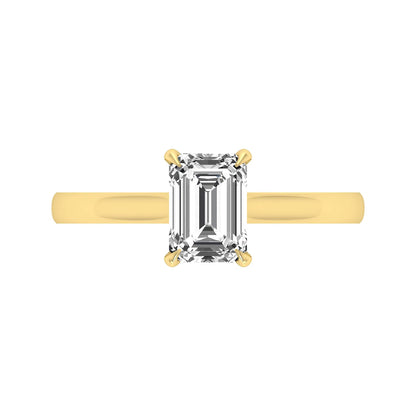 Emerald cut lab grown diamond solitaire engagement ring featuring a 1.06 carat emerald diamond in a classic four-prong setting in yellow gold