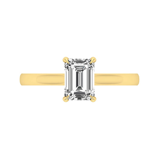 Emerald cut lab grown diamond solitaire engagement ring featuring a 1.06 carat emerald diamond in a classic four-prong setting in yellow gold