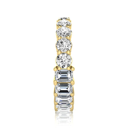 Emerald and round cut lab grown diamond full eternity band ring in yellow gold