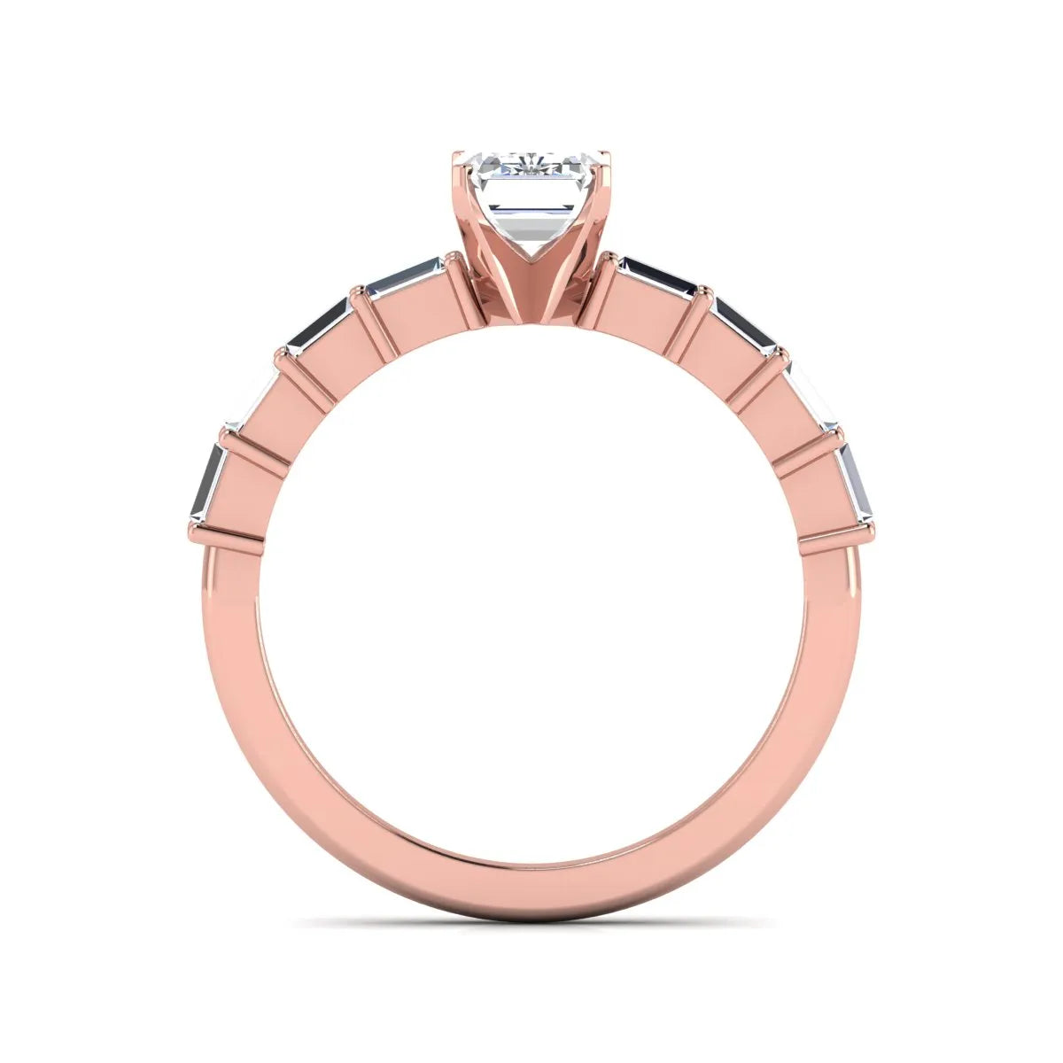 Emerald cut lab grown diamond engagement ring with baguette side diamonds in a four-prong solitaire accent setting and rose gold tone band.