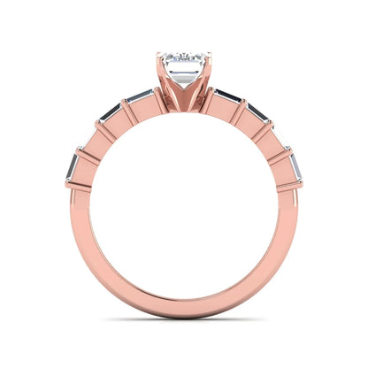 Emerald cut lab grown diamond engagement ring with baguette side diamonds in a four-prong solitaire accent setting and rose gold tone band.