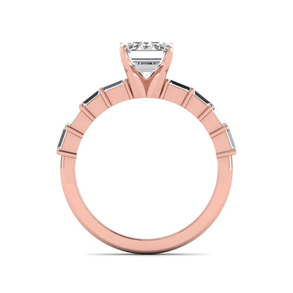 Emerald cut lab grown diamond engagement ring with baguette side diamonds in a four-prong solitaire accent setting and rose gold tone band.