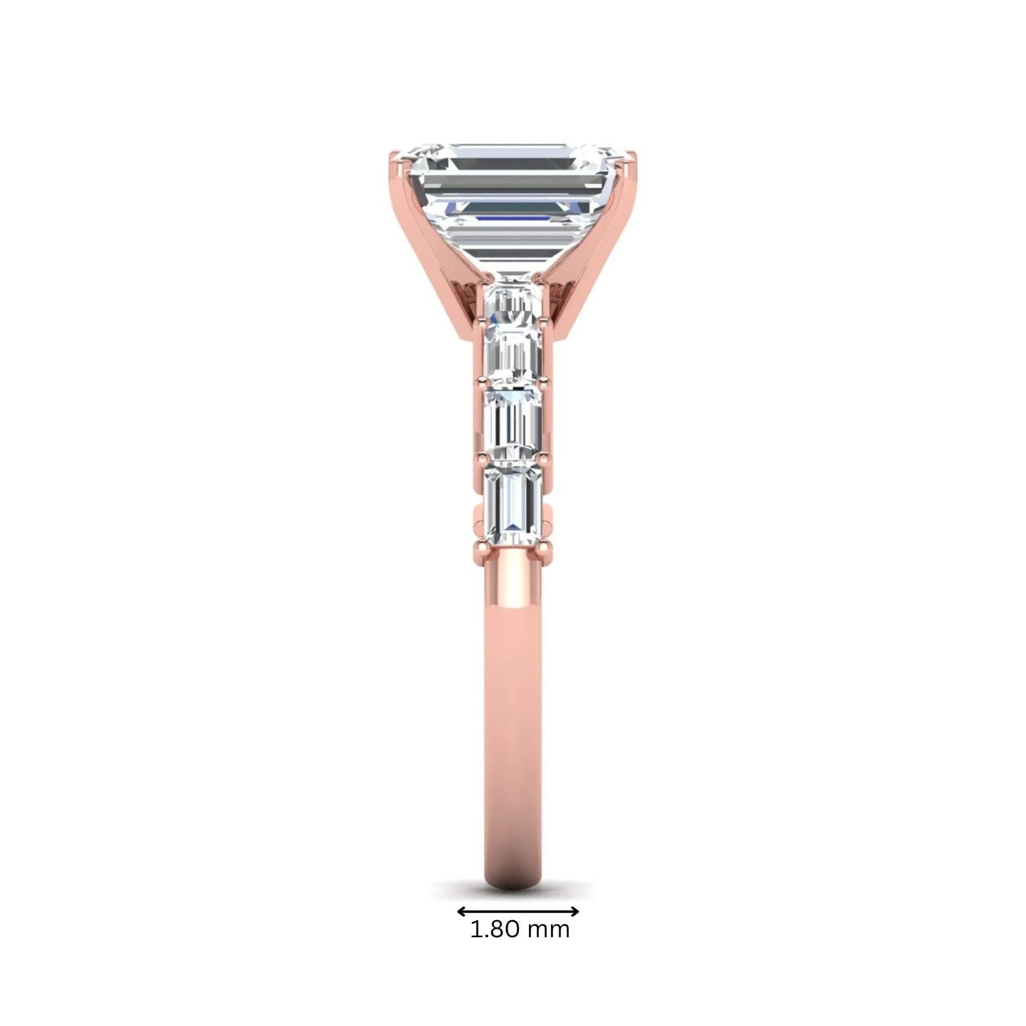 Emerald cut lab grown diamond engagement ring with baguette side diamonds in a four-prong solitaire accent setting and rose gold tone band.