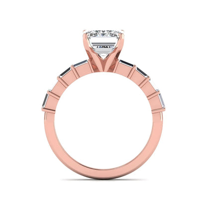 Emerald cut lab grown diamond engagement ring with baguette side diamonds in a four-prong solitaire accent setting and rose gold tone band.