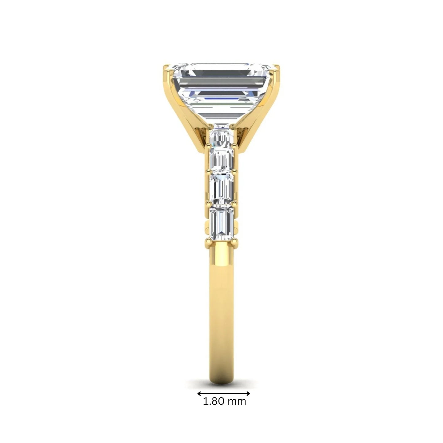 Emerald cut lab grown diamond engagement ring with baguette side diamonds in a four-prong solitaire accent setting and yellow gold tone band.