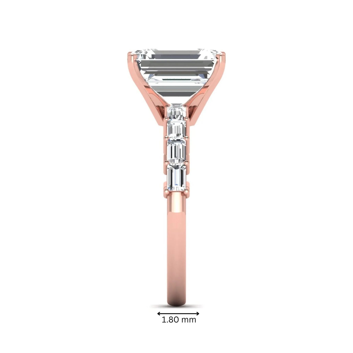 Emerald cut lab grown diamond engagement ring with baguette side diamonds in a four-prong solitaire accent setting and rose gold tone band.