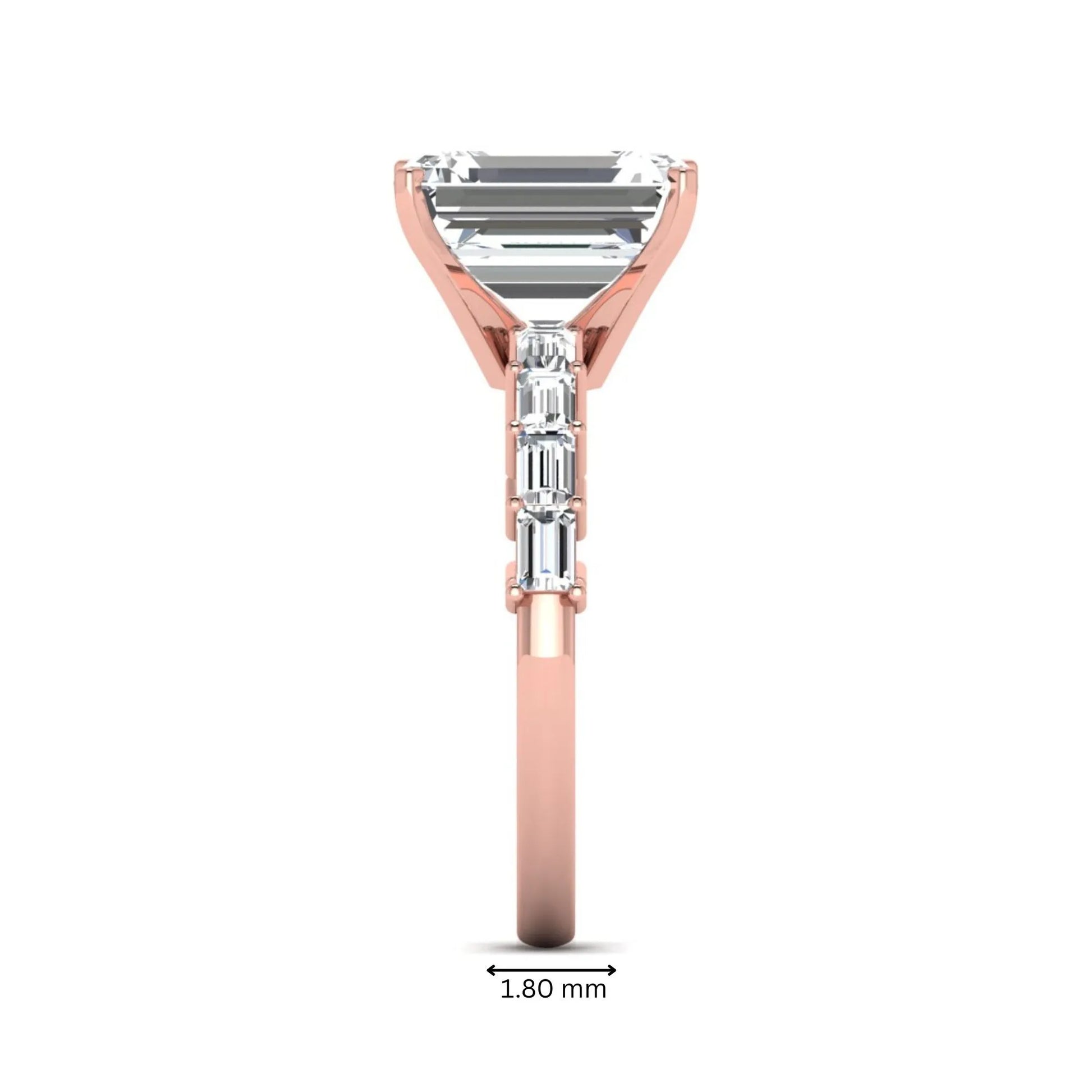 Emerald cut lab grown diamond engagement ring with baguette side diamonds in a four-prong solitaire accent setting and rose gold tone band.
