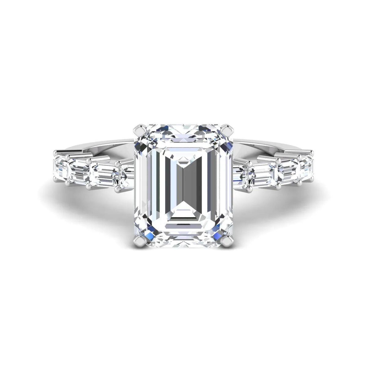 Emerald cut lab grown diamond engagement ring with baguette side diamonds in a four-prong solitaire accent setting and white gold tone band.