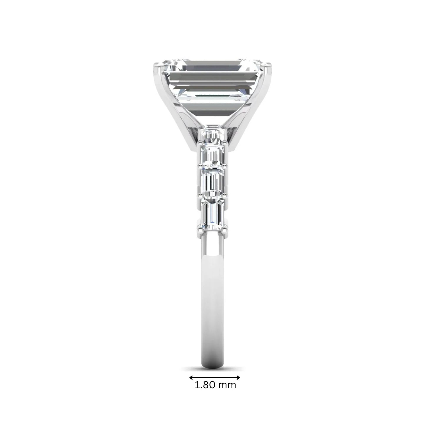 Emerald cut lab grown diamond engagement ring with baguette side diamonds in a four-prong solitaire accent setting and white gold tone band.