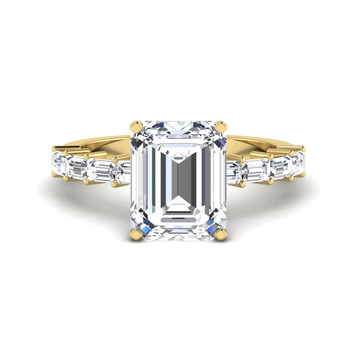 Emerald cut lab grown diamond engagement ring with baguette side diamonds in a four-prong solitaire accent setting and yellow gold tone band.