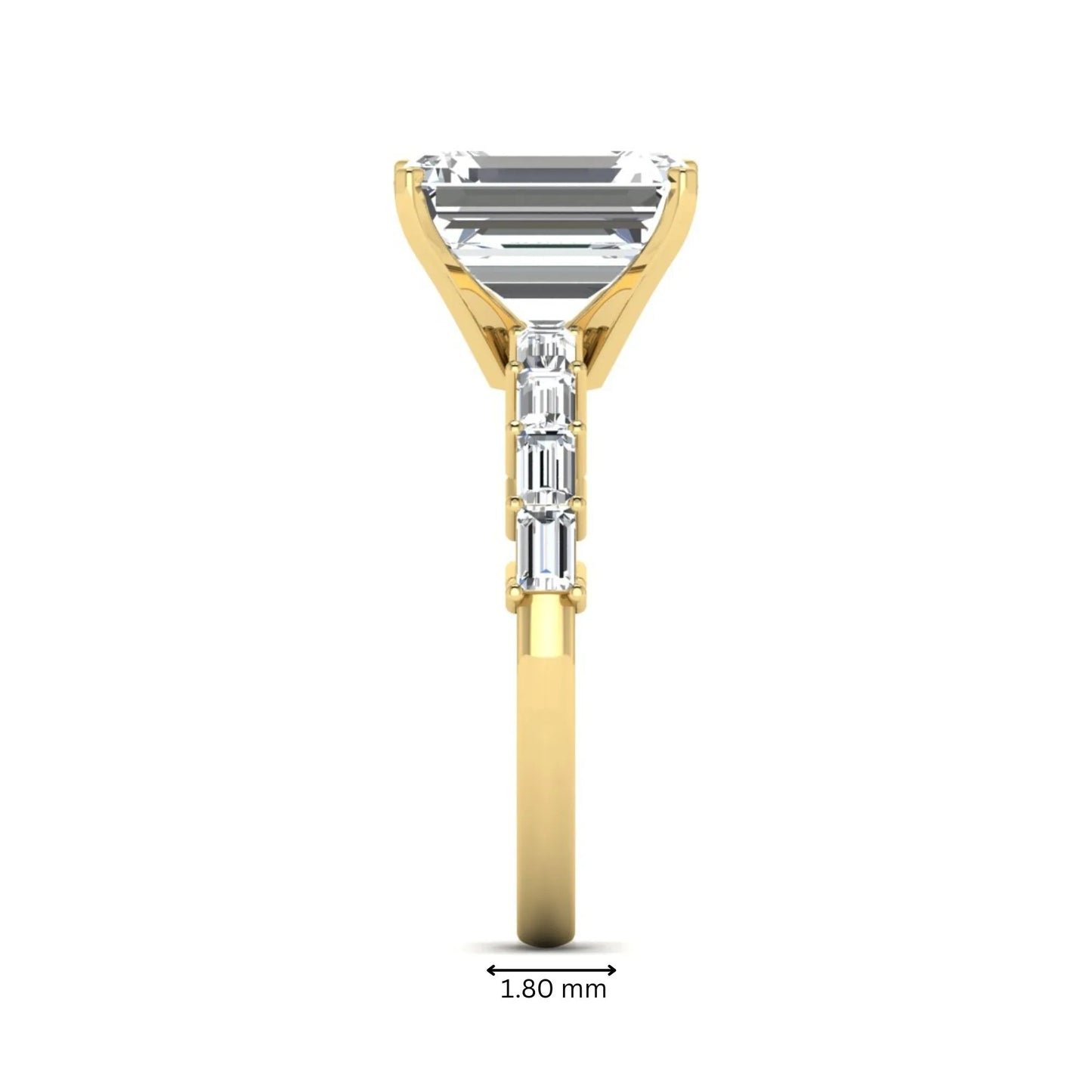 Emerald cut lab grown diamond engagement ring with baguette side diamonds in a four-prong solitaire accent setting and yellow gold tone band.