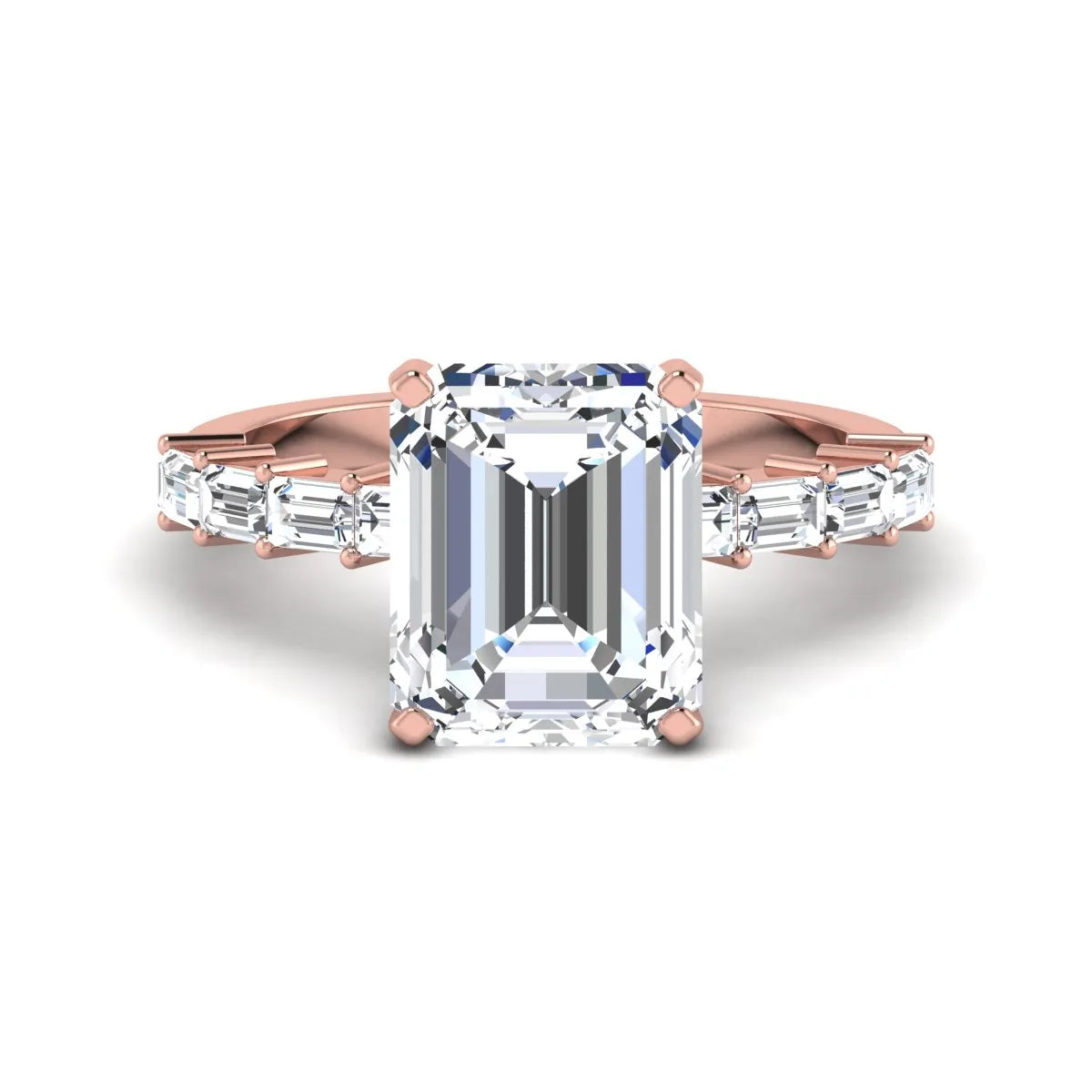 Emerald cut lab grown diamond engagement ring with baguette side diamonds in a four-prong solitaire accent setting and rose gold tone band.