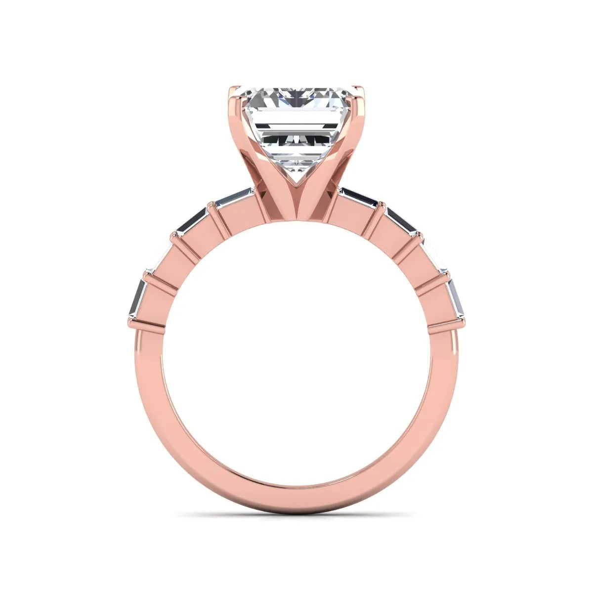 Emerald cut lab grown diamond engagement ring with baguette side diamonds in a four-prong solitaire accent setting and rose gold tone band.