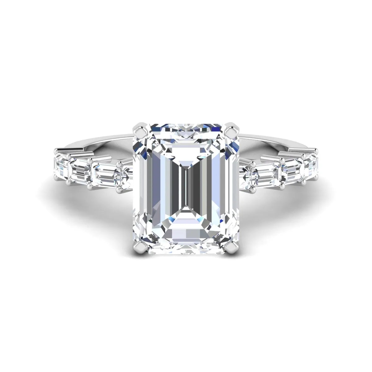 Emerald cut lab grown diamond engagement ring with baguette side diamonds in a four-prong solitaire accent setting and white gold tone band.
