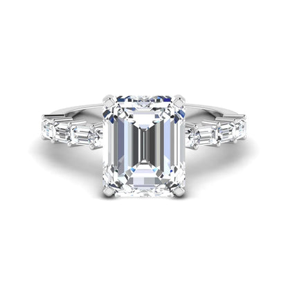 Emerald cut lab grown diamond engagement ring with baguette side diamonds in a four-prong solitaire accent setting and white gold tone band.