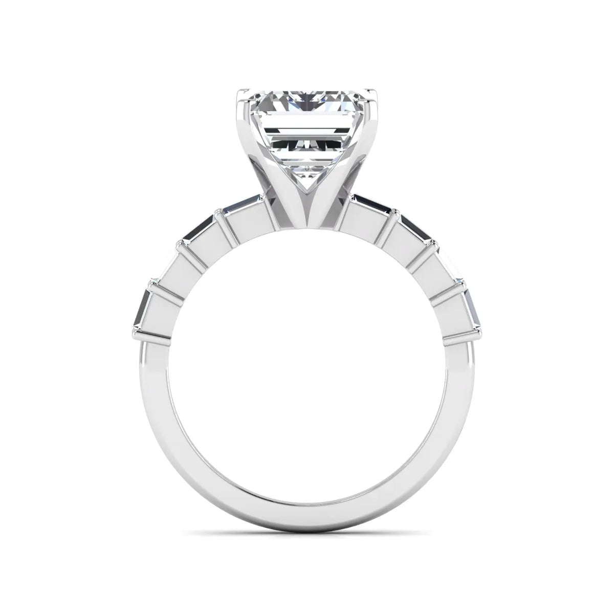 Emerald cut lab grown diamond engagement ring with baguette side diamonds in a four-prong solitaire accent setting and white gold tone band.