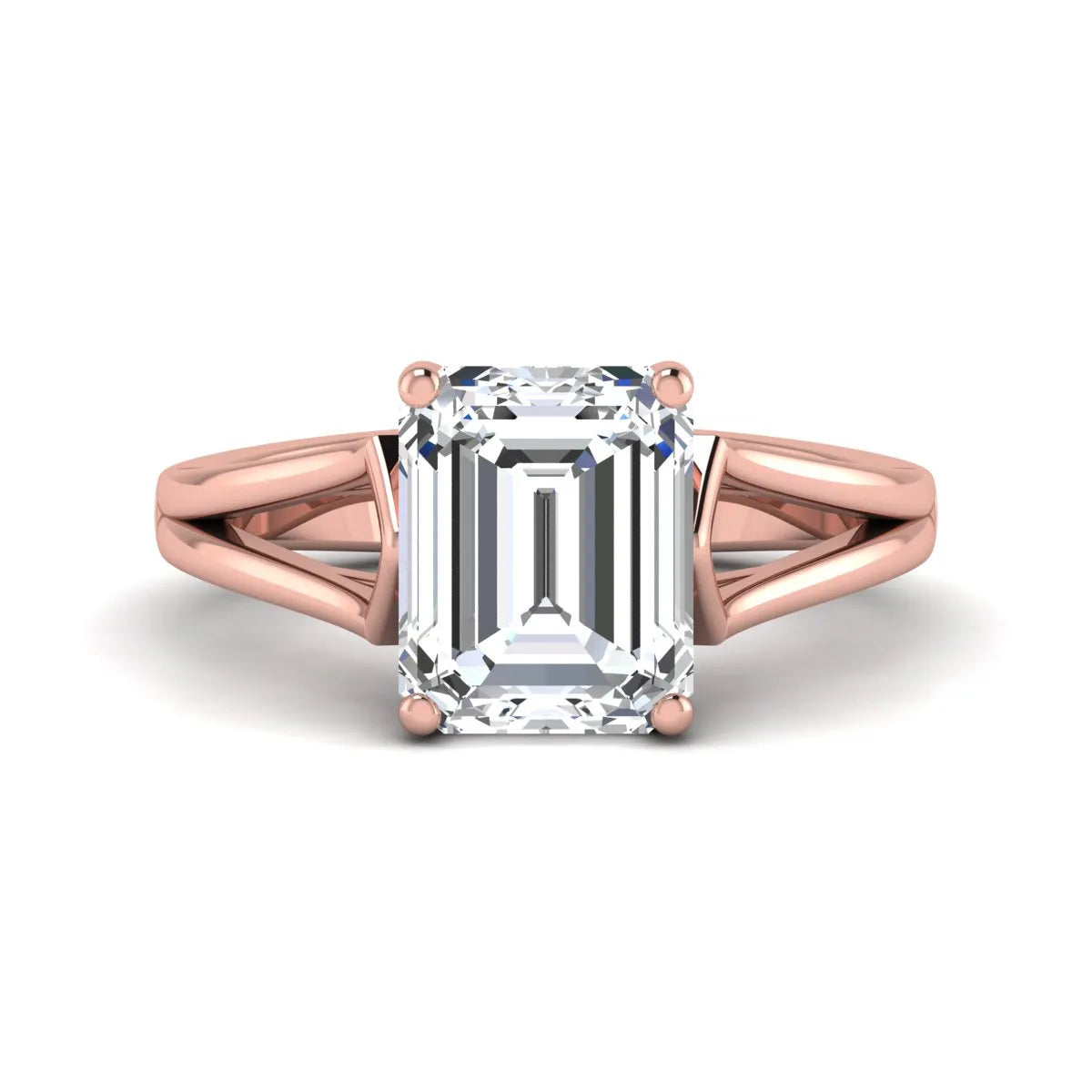 Emerald cut lab grown diamond solitaire engagement ring featuring a four-prong cathedral setting with sculpted split cathedral shoulders in a rose gold finish.