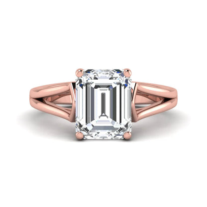 Emerald cut lab grown diamond solitaire engagement ring featuring a four-prong cathedral setting with sculpted split cathedral shoulders in a rose gold finish.