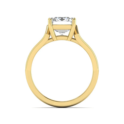 Emerald cut lab grown diamond solitaire engagement ring featuring a four-prong cathedral setting with sculpted split cathedral shoulders in a yellow gold finish.