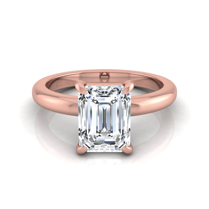 Emerald cut lab grown diamond solitaire engagement ring featuring an IGI certified center diamond in a classic four-prong setting with a polished band in rose gold