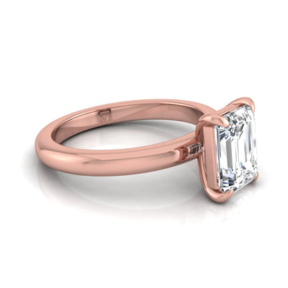 Emerald cut lab grown diamond solitaire engagement ring featuring an IGI certified center diamond in a classic four-prong setting with a polished band in rose gold