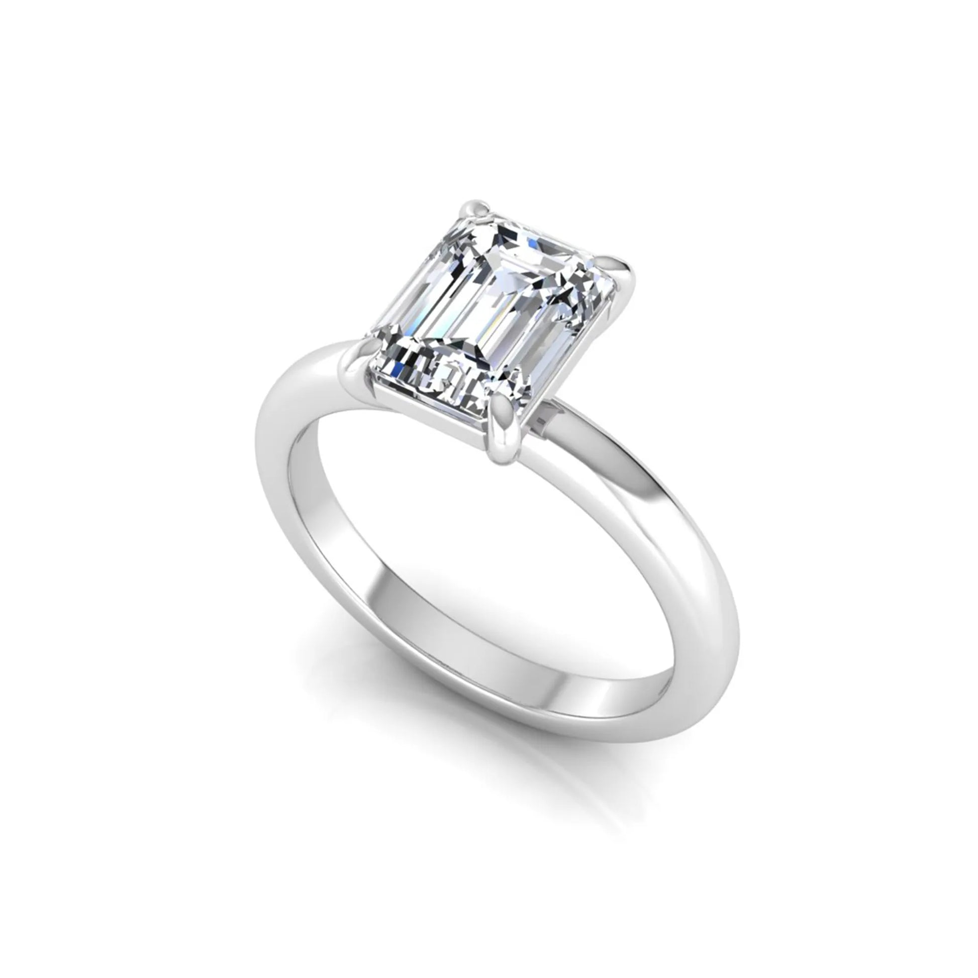 Emerald cut lab grown diamond solitaire engagement ring featuring an IGI certified center diamond in a classic four-prong setting with a polished band in white gold