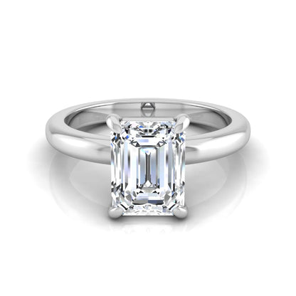 Emerald cut lab grown diamond solitaire engagement ring featuring an IGI certified center diamond in a classic four-prong setting with a polished band in white gold