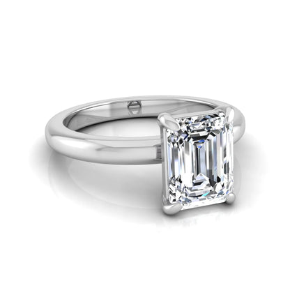 Emerald cut lab grown diamond solitaire engagement ring featuring an IGI certified center diamond in a classic four-prong setting with a polished band in white gold