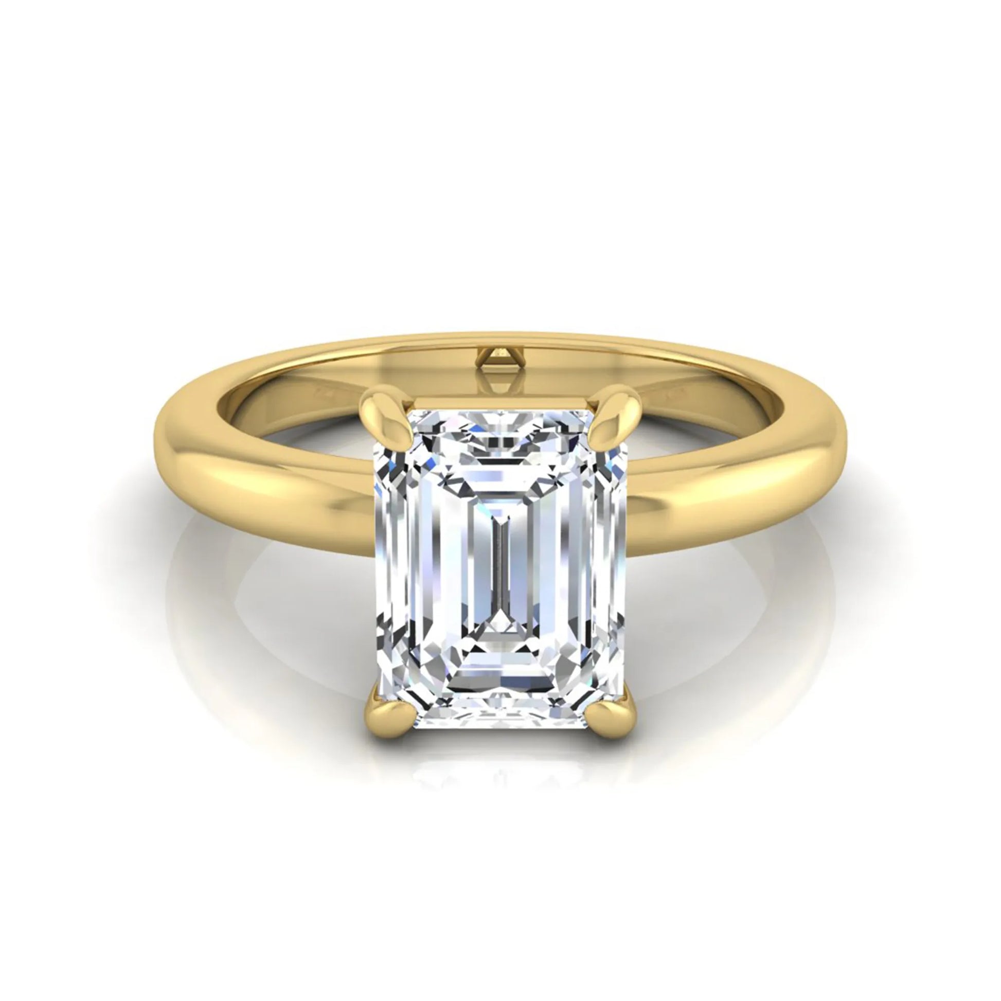 Emerald cut lab grown diamond solitaire engagement ring featuring an IGI certified center diamond in a classic four-prong setting with a polished band in yellow gold