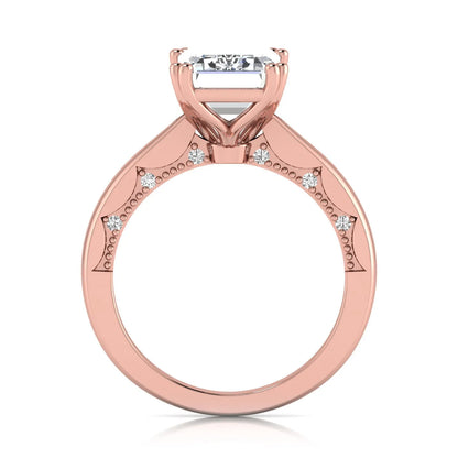 Emerald cut lab grown diamond engagement ring featuring a 3.01 carat IGI certified center diamond in a four-prong solitaire setting with hidden round diamond accents beneath the gallery and a polished rose gold band.