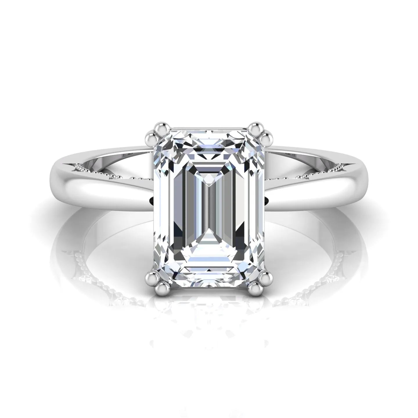 Emerald cut lab grown diamond engagement ring featuring a 3.01 carat IGI certified center diamond in a four-prong solitaire setting with hidden round diamond accents beneath the gallery and a polished white gold band.