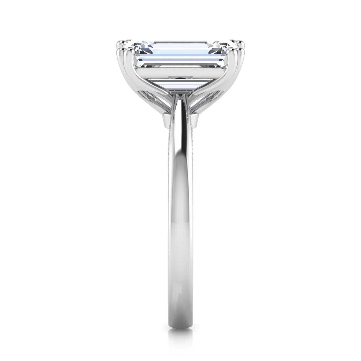 Emerald cut lab grown diamond engagement ring featuring a 3.01 carat IGI certified center diamond in a four-prong solitaire setting with hidden round diamond accents beneath the gallery and a polished white gold band.