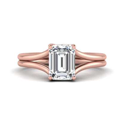 IGI certified 1.75 carat emerald cut lab grown diamond solitaire engagement ring with elegant split shank in rose gold.