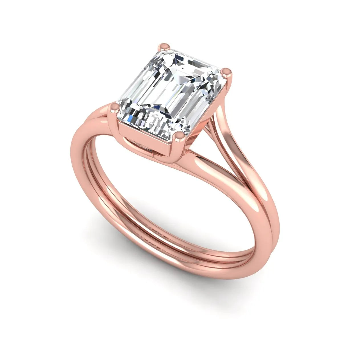 IGI certified 1.75 carat emerald cut lab grown diamond solitaire engagement ring with elegant split shank in rose gold.